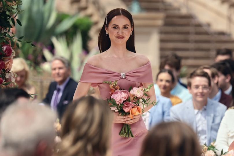 Every Outrageous Outfit From Nate and Cassie's Wedding On Euphoria - Lexi's pink bridesmaids dress